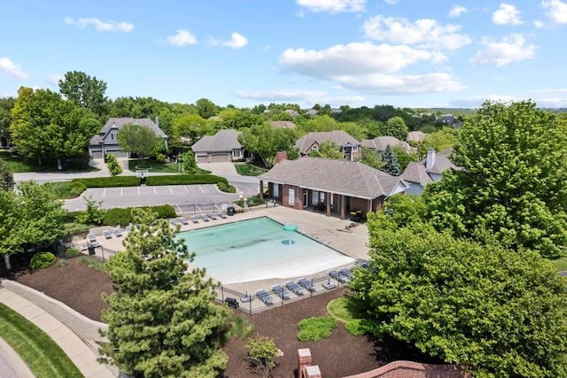 8127 Lone Elm Rd, Lenexa, KS 66220 - community pool featuring a patio area and a residential view