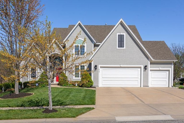 8127 Lone Elm Rd, Lenexa, KS 66220 - traditional home featuring driveway, a front yard, roof with shingles, and a garage