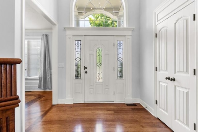 8127 Lone Elm Rd, Lenexa, KS 66220 - entryway featuring wood finished floors and baseboards