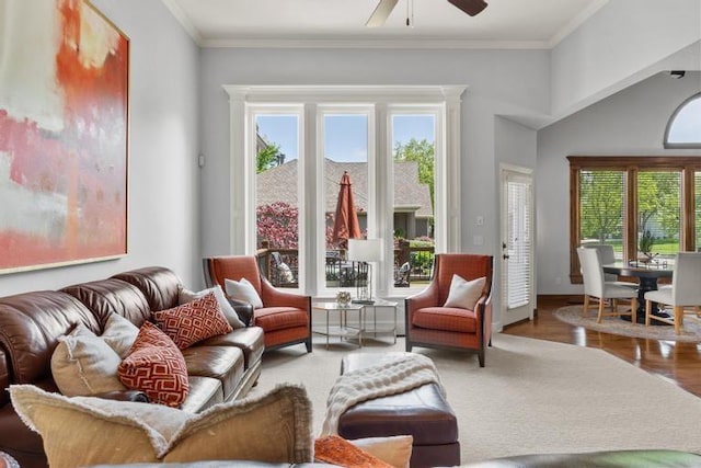 8127 Lone Elm Rd, Lenexa, KS 66220 - living area with ceiling fan, wood finished floors, baseboards, and crown molding