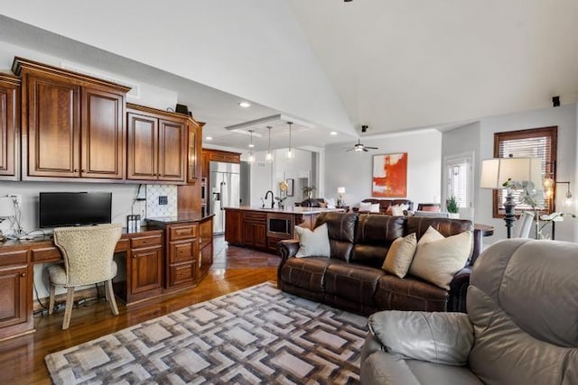 8127 Lone Elm Rd, Lenexa, KS 66220 - living room with vaulted ceiling, a ceiling fan, dark wood-type flooring, and recessed lighting