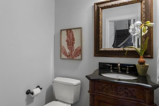 8127 Lone Elm Rd, Lenexa, KS 66220 - half bathroom featuring toilet and vanity