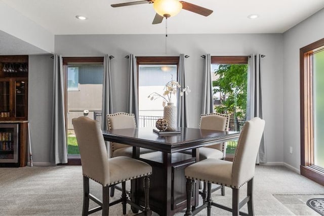 8127 Lone Elm Rd, Lenexa, KS 66220 - dining area with light carpet, a ceiling fan, baseboards, and recessed lighting