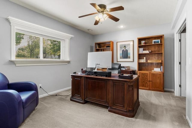 8127 Lone Elm Rd, Lenexa, KS 66220 - office area with light colored carpet, ceiling fan, and baseboards