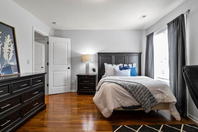 8127 Lone Elm Rd, Lenexa, KS 66220 - bedroom with dark wood-style floors