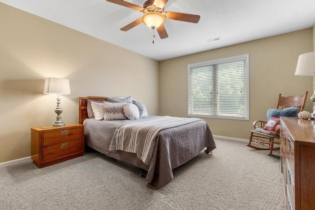 8127 Lone Elm Rd, Lenexa, KS 66220 - bedroom featuring baseboards, light colored carpet, and a ceiling fan