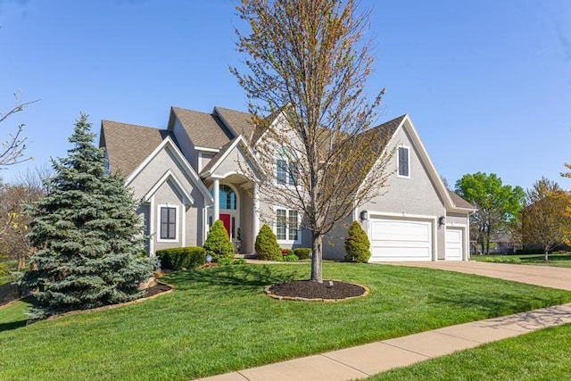 8127 Lone Elm Rd, Lenexa, KS 66220 - traditional-style home featuring stucco siding, driveway, a garage, and a front lawn