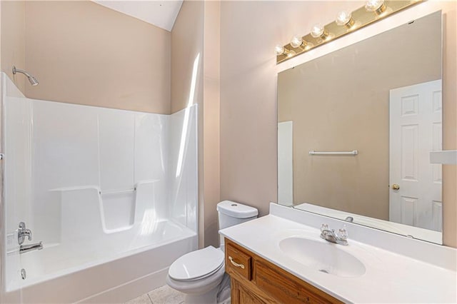 full bathroom with toilet, washtub / shower combination, vanity, and tile patterned floors