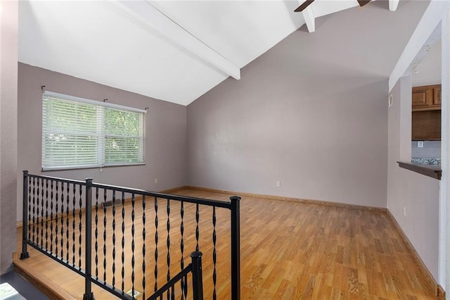 4010 Hedges Ave, Kansas City, MO 64133 - stairway featuring wood finished floors and baseboards