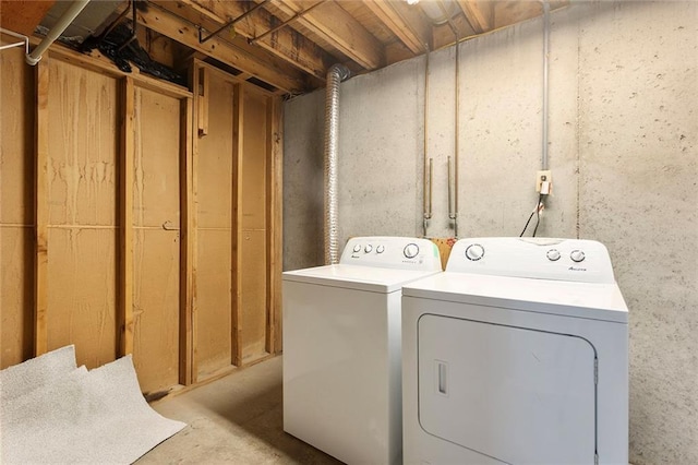 4010 Hedges Ave, Kansas City, MO 64133 - clothes washing area featuring washer and dryer