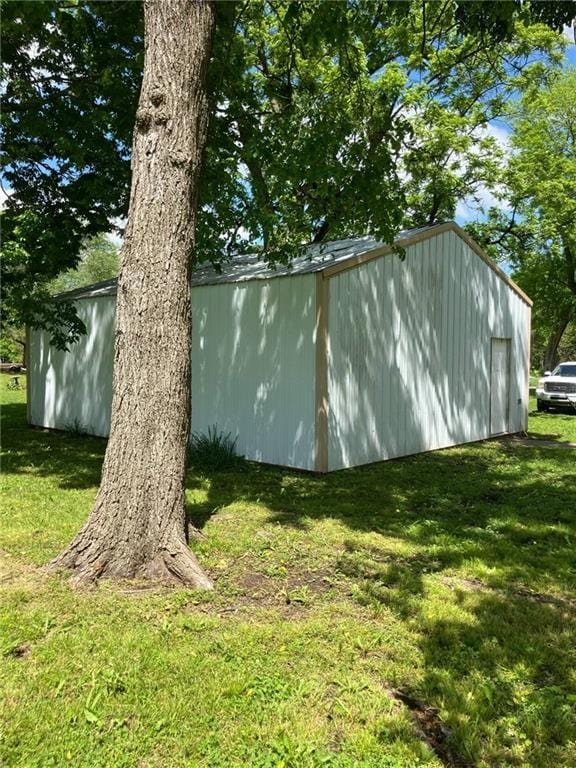 206 W 5th St, Pleasanton, KS 66075 - view of outbuilding featuring an outdoor structure