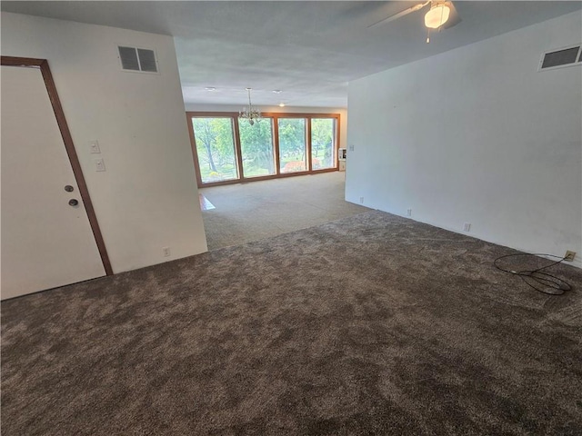 33295 Bethel Church Rd, Osawatomie, KS 66064 - spare room with carpet floors, a chandelier, and a ceiling fan