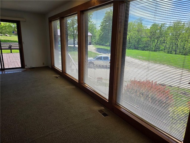33295 Bethel Church Rd, Osawatomie, KS 66064 - doorway to outside with dark colored carpet