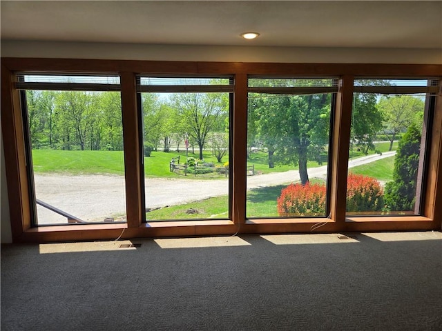 33295 Bethel Church Rd, Osawatomie, KS 66064 - doorway to outside featuring carpet flooring