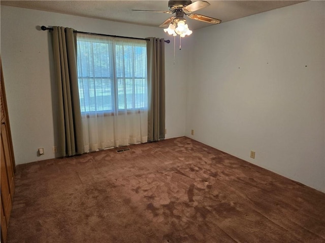 33295 Bethel Church Rd, Osawatomie, KS 66064 - carpeted spare room featuring ceiling fan