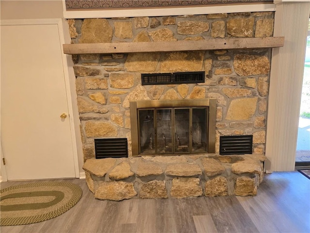 33295 Bethel Church Rd, Osawatomie, KS 66064 - detailed view of a fireplace and wood finished floors