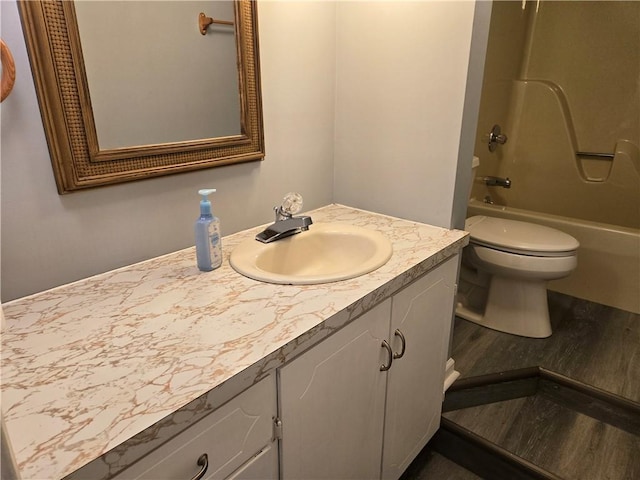 33295 Bethel Church Rd, Osawatomie, KS 66064 - full bath featuring vanity, toilet, and shower / washtub combination