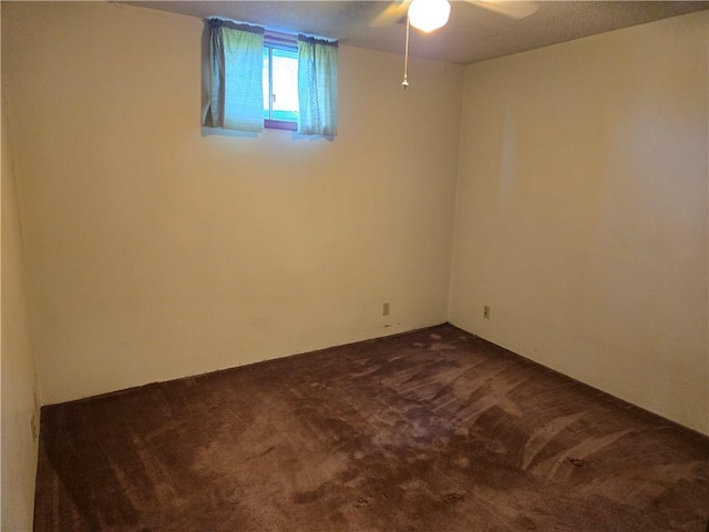 33295 Bethel Church Rd, Osawatomie, KS 66064 - empty room with dark carpet and ceiling fan