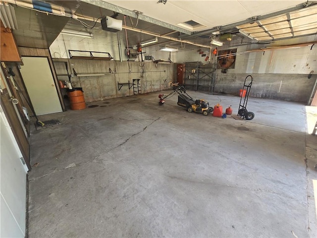 33295 Bethel Church Rd, Osawatomie, KS 66064 - garage featuring a garage door opener