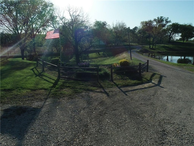 33295 Bethel Church Rd, Osawatomie, KS 66064 - view of dirt / gravel road with a water view
