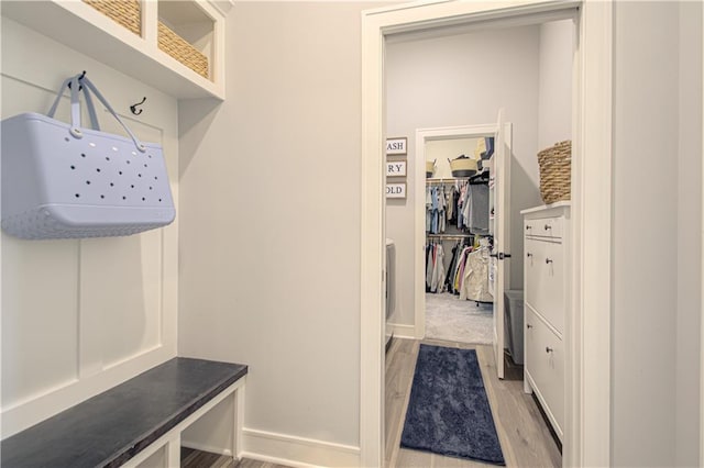 11410 Bluestem Dr, Kearney, MO 64060 - mudroom with light wood-type flooring and baseboards