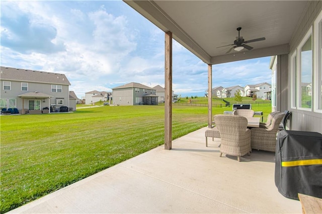 11410 Bluestem Dr, Kearney, MO 64060 - view of patio / terrace featuring a residential view, ceiling fan, and outdoor dining space