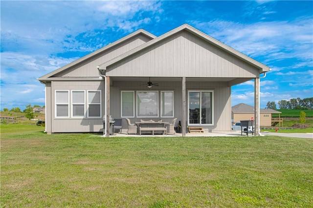 11410 Bluestem Dr, Kearney, MO 64060 - rear view of house with ceiling fan, outdoor lounge area, a lawn, and a patio area