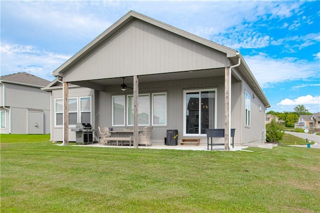 11410 Bluestem Dr, Kearney, MO 64060 - rear view of property with a ceiling fan, a patio area, and a lawn