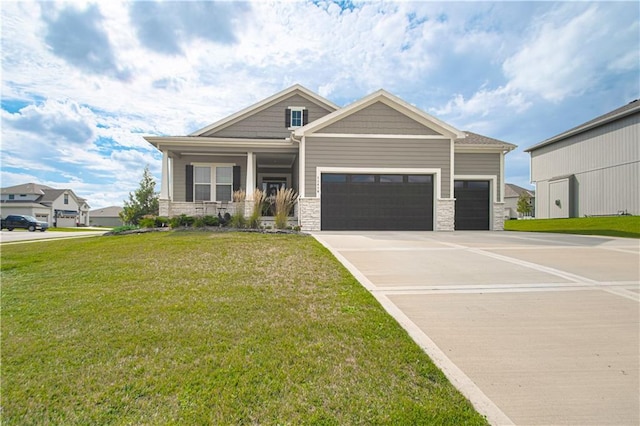 11410 Bluestem Dr, Kearney, MO 64060 - craftsman-style home featuring a porch, a front lawn, concrete driveway, a garage, and stone siding
