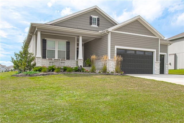 11410 Bluestem Dr, Kearney, MO 64060 - craftsman inspired home featuring stone siding, covered porch, and a front yard