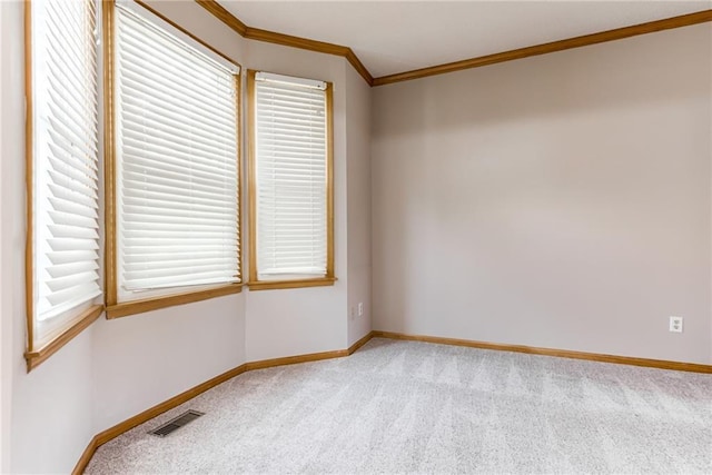 4901 NW 87th St, Kansas City, MO 64154 - carpeted spare room featuring ornamental molding and baseboards