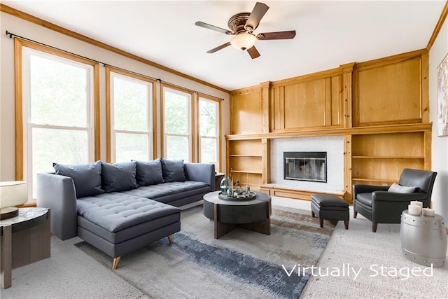 4901 NW 87th St, Kansas City, MO 64154 - carpeted living room featuring a ceiling fan and a fireplace