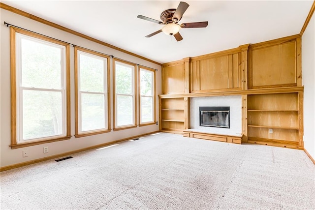 4901 NW 87th St, Kansas City, MO 64154 - unfurnished living room with carpet floors, baseboards, a fireplace, and a ceiling fan