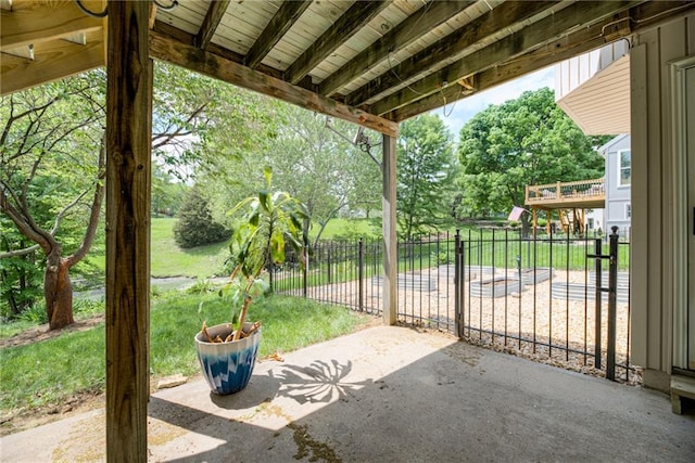 4901 NW 87th St, Kansas City, MO 64154 - view of patio featuring fence, view of scattered trees, and a gate