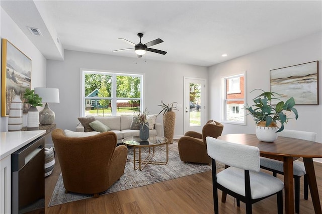 living room featuring ceiling fan, wood finished floors, and recessed lighting