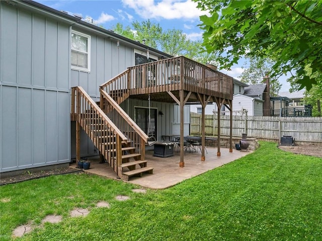 15328 W 81st St, Lenexa, KS 66219 - rear view of house featuring a wooden deck, stairs, a patio, and board and batten siding