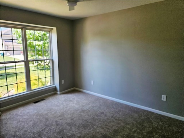 1309 Thomas Dr, Louisburg, KS 66053 - carpeted empty room with baseboards and ceiling fan