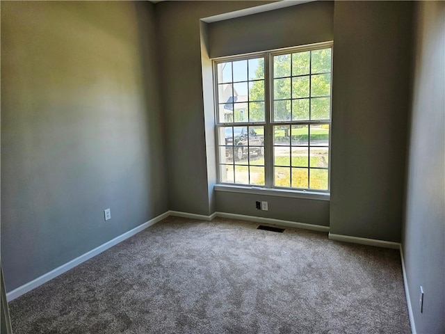 1309 Thomas Dr, Louisburg, KS 66053 - carpeted spare room with baseboards