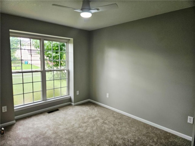 1309 Thomas Dr, Louisburg, KS 66053 - unfurnished room featuring a ceiling fan, carpet floors, and baseboards