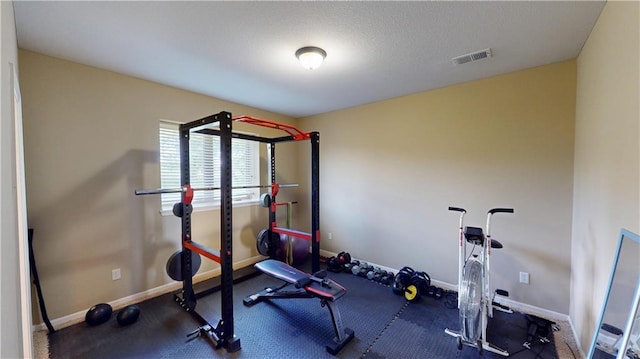 4301 N 141st St, Basehor, KS 66007 - exercise room featuring baseboards