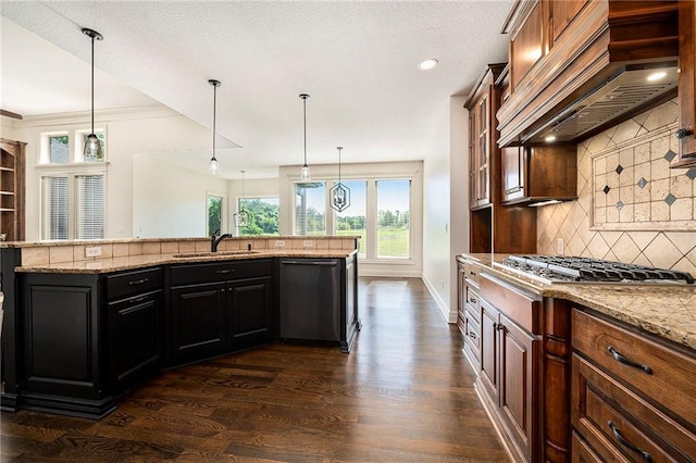 4301 N 141st St, Basehor, KS 66007 - kitchen with dishwashing machine, backsplash, dark wood finished floors, custom range hood, and light stone countertops