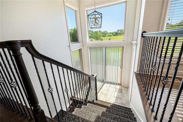 4301 N 141st St, Basehor, KS 66007 - stairway with a high ceiling and baseboards