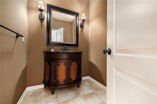 4301 N 141st St, Basehor, KS 66007 - bathroom with baseboards and vanity