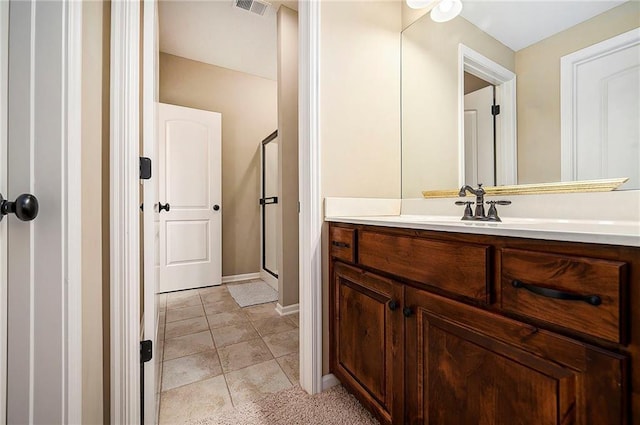 4301 N 141st St, Basehor, KS 66007 - full bath featuring vanity, a stall shower, and tile patterned flooring