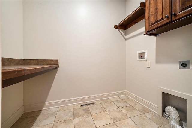 4301 N 141st St, Basehor, KS 66007 - washroom featuring electric dryer hookup, cabinet space, and hookup for a washing machine
