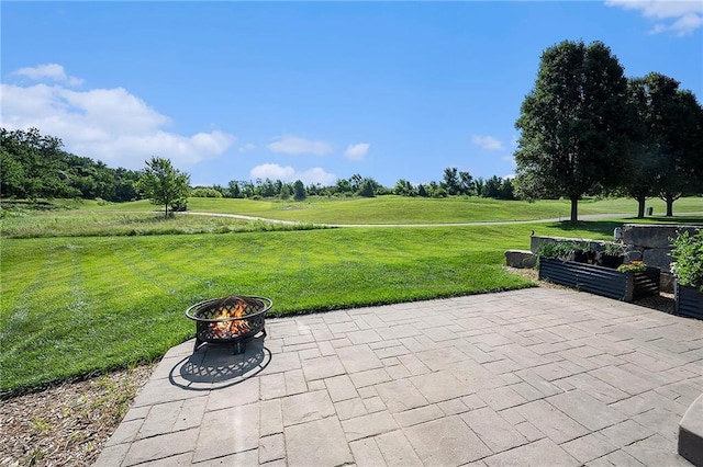4301 N 141st St, Basehor, KS 66007 - view of patio with an outdoor fire pit