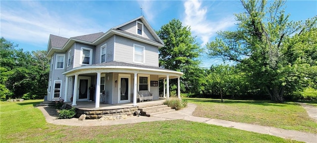 513 Pinto Rd, Yates Center, KS 66783 - view of front of home featuring covered porch and a front yard