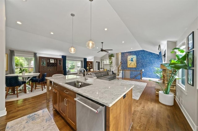 10319 W 92nd Pl, Overland Park, KS 66214 - kitchen featuring stainless steel dishwasher, plenty of natural light, open floor plan, vaulted ceiling, and dark wood finished floors