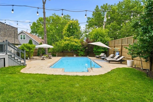 10319 W 92nd Pl, Overland Park, KS 66214 - view of swimming pool with a fenced backyard, stairway, and a patio area