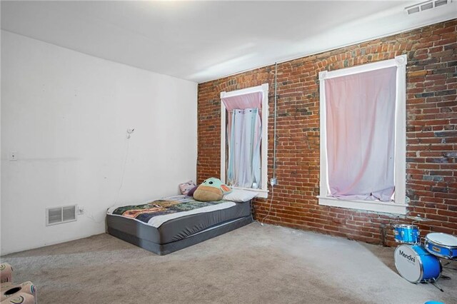 432 S 5th St, Atchison, KS 66002 - bedroom with carpet and brick wall